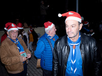 People wearing Santa Claus costumes participate in the annual Santa Run in Athens, Greece, on December 14, 2024. (