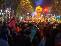 A demonstration against repressive migration policies gathers several hundred people in Paris, France, on December 14. Protesters march thro...