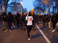 A demonstration against repressive migration policies gathers several hundred people in Paris, France, on December 14. Protesters march thro...