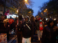 A demonstration against repressive migration policies gathers several hundred people in Paris, France, on December 14. Protesters march thro...