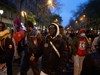 A demonstration against repressive migration policies gathers several hundred people in Paris, France, on December 14. Protesters march thro...