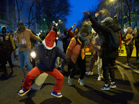 A demonstration against repressive migration policies gathers several hundred people in Paris, France, on December 14. Protesters march thro...