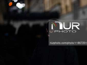 Police officers block the Georgian Parliament building as anti-government demonstrators gather outside the parliament in Tbilisi, Georgia, o...