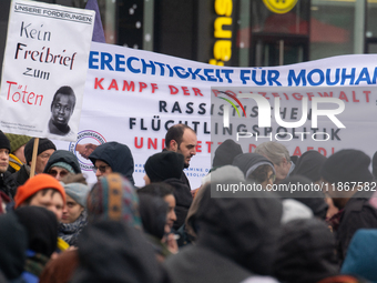 More than a thousand people take part in a demonstration against the latest court verdict over the police shooting that results in the death...