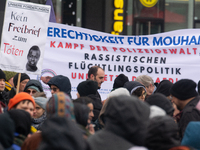 More than a thousand people take part in a demonstration against the latest court verdict over the police shooting that results in the death...