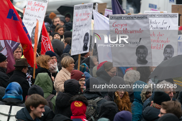 More than a thousand people take part in a demonstration against the latest court verdict over the police shooting that results in the death...