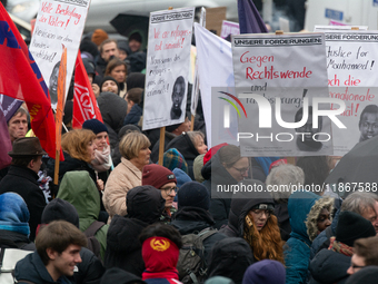 More than a thousand people take part in a demonstration against the latest court verdict over the police shooting that results in the death...