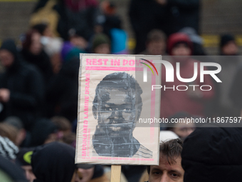 More than a thousand people take part in a demonstration against the latest court verdict over the police shooting that results in the death...