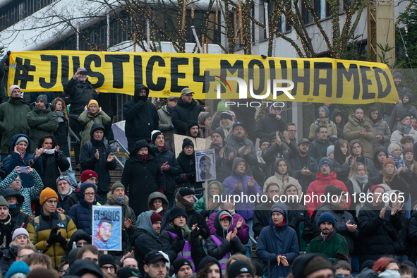 More than a thousand people take part in a demonstration against the latest court verdict over the police shooting that results in the death...