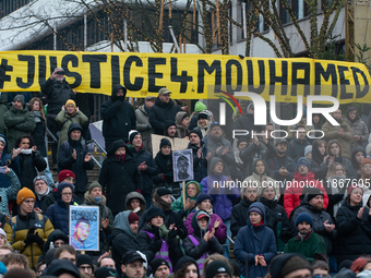 More than a thousand people take part in a demonstration against the latest court verdict over the police shooting that results in the death...