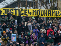 More than a thousand people take part in a demonstration against the latest court verdict over the police shooting that results in the death...