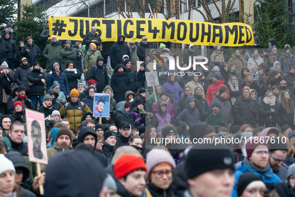 More than a thousand people take part in a demonstration against the latest court verdict over the police shooting that results in the death...