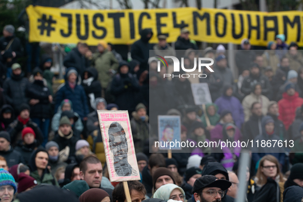 More than a thousand people take part in a demonstration against the latest court verdict over the police shooting that results in the death...