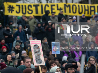 More than a thousand people take part in a demonstration against the latest court verdict over the police shooting that results in the death...