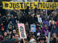 More than a thousand people take part in a demonstration against the latest court verdict over the police shooting that results in the death...