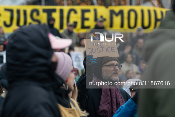 More than a thousand people take part in a demonstration against the latest court verdict over the police shooting that results in the death...