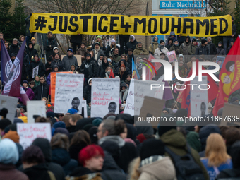 More than a thousand people take part in a demonstration against the latest court verdict over the police shooting that results in the death...