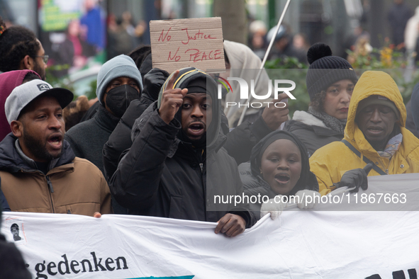 More than a thousand people take part in a demonstration against the latest court verdict over the police shooting that results in the death...