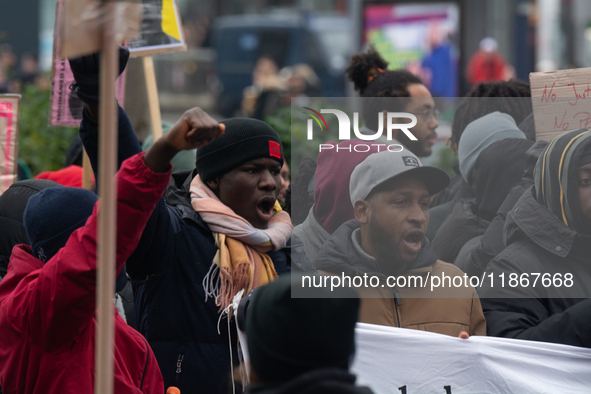 More than a thousand people take part in a demonstration against the latest court verdict over the police shooting that results in the death...