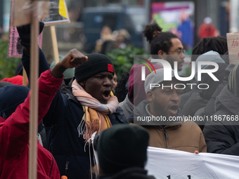 More than a thousand people take part in a demonstration against the latest court verdict over the police shooting that results in the death...