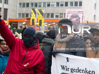 More than a thousand people take part in a demonstration against the latest court verdict over the police shooting that results in the death...