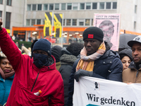 More than a thousand people take part in a demonstration against the latest court verdict over the police shooting that results in the death...