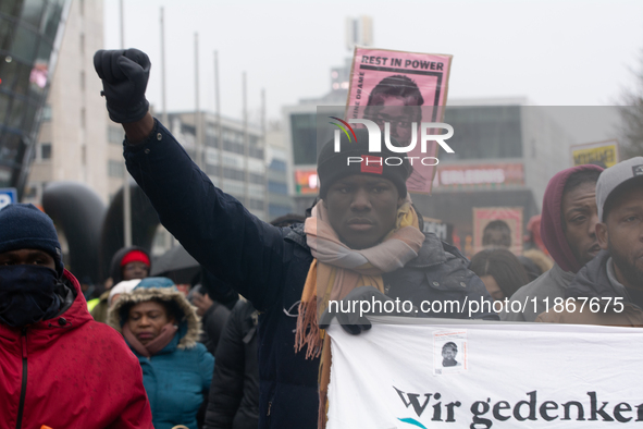 More than a thousand people take part in a demonstration against the latest court verdict over the police shooting that results in the death...