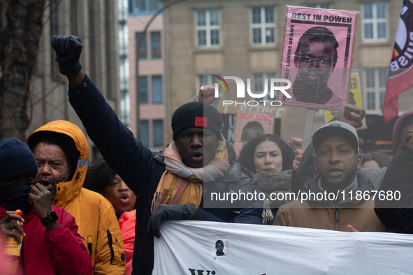 More than a thousand people take part in a demonstration against the latest court verdict over the police shooting that results in the death...