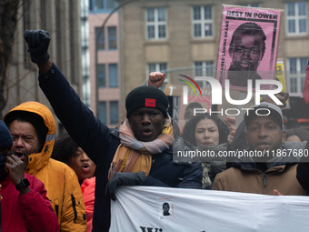 More than a thousand people take part in a demonstration against the latest court verdict over the police shooting that results in the death...