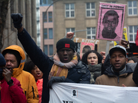 More than a thousand people take part in a demonstration against the latest court verdict over the police shooting that results in the death...