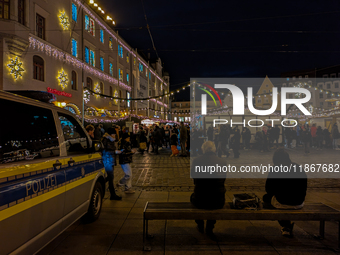 Enhanced security at the Christmas market in Augsburg, Bavaria, Germany, ensures a safe and festive atmosphere on December 14, 2024. The Chr...