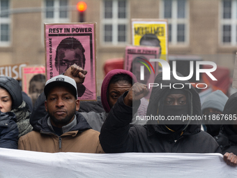 More than a thousand people take part in a demonstration against the latest court verdict over the police shooting that results in the death...