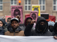 More than a thousand people take part in a demonstration against the latest court verdict over the police shooting that results in the death...