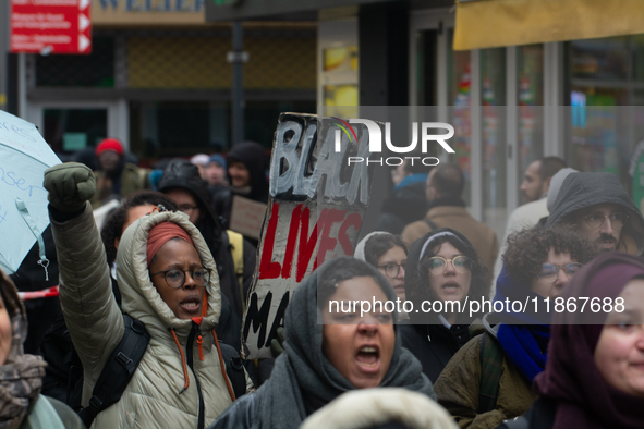 More than a thousand people take part in a demonstration against the latest court verdict over the police shooting that results in the death...