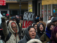 More than a thousand people take part in a demonstration against the latest court verdict over the police shooting that results in the death...