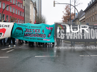 More than a thousand people take part in a demonstration against the latest court verdict over the police shooting that results in the death...