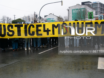 More than a thousand people take part in a demonstration against the latest court verdict over the police shooting that results in the death...