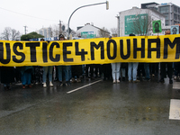 More than a thousand people take part in a demonstration against the latest court verdict over the police shooting that results in the death...