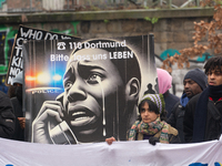 More than a thousand people take part in a demonstration against the latest court verdict over the police shooting that results in the death...