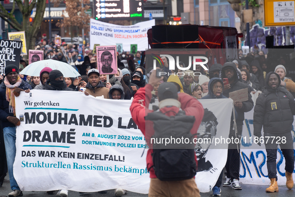 More than a thousand people take part in a demonstration against the latest court verdict over the police shooting that results in the death...