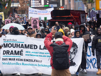 More than a thousand people take part in a demonstration against the latest court verdict over the police shooting that results in the death...