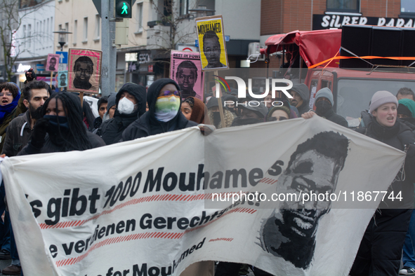 More than a thousand people take part in a demonstration against the latest court verdict over the police shooting that results in the death...