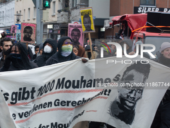 More than a thousand people take part in a demonstration against the latest court verdict over the police shooting that results in the death...