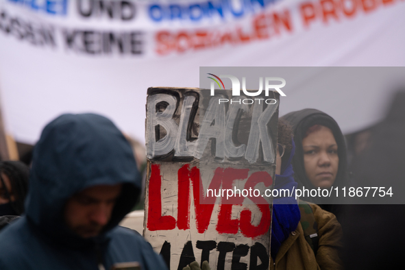 More than a thousand people take part in a demonstration against the latest court verdict over the police shooting that results in the death...