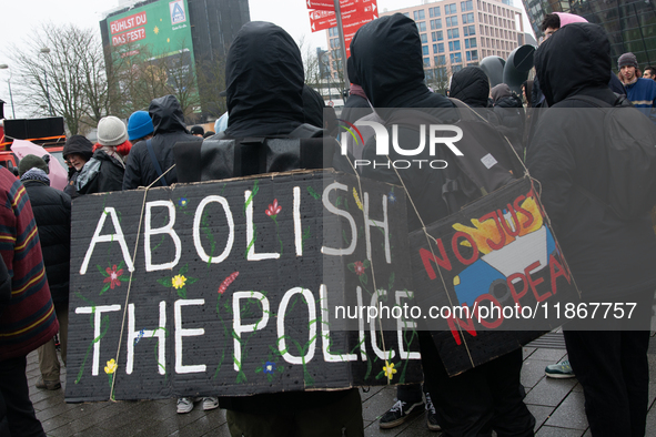 More than a thousand people take part in a demonstration against the latest court verdict over the police shooting that results in the death...