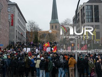 More than a thousand people take part in a demonstration against the latest court verdict over the police shooting that results in the death...