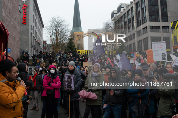 More than a thousand people take part in a demonstration against the latest court verdict over the police shooting that results in the death...