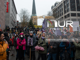 More than a thousand people take part in a demonstration against the latest court verdict over the police shooting that results in the death...