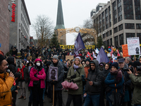 More than a thousand people take part in a demonstration against the latest court verdict over the police shooting that results in the death...