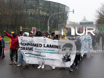 More than a thousand people take part in a demonstration against the latest court verdict over the police shooting that results in the death...